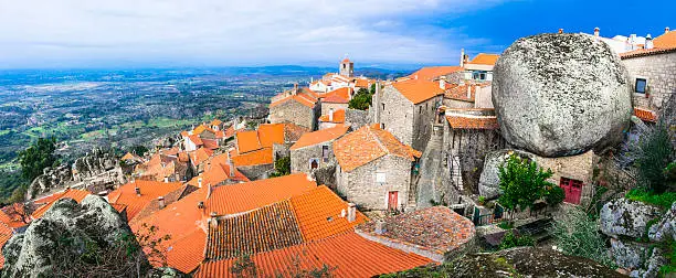 Photo of most beautiful villages - Monsanto , over granite rocks . Portugal.