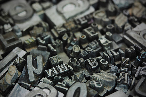istock Close up of typeset letters 516794614