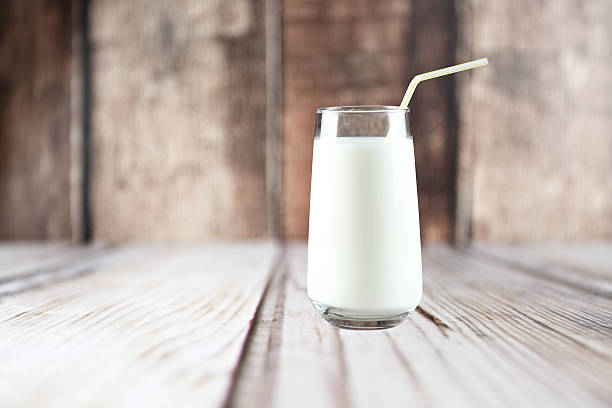 istock Glass of milk on the table 516798746