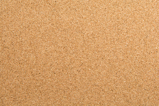 horizontal view of a blank cork board texture