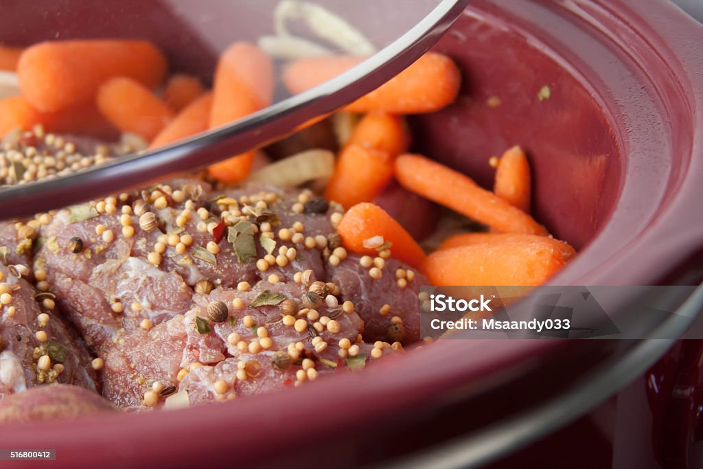 Traditional corned beef and cabbage in a slow cooker Crock Pot Stock Photo