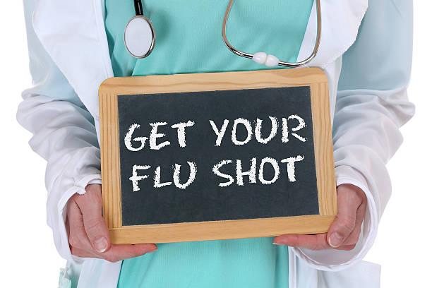Get your flu shot disease ill illness healthy health doctor stock photo