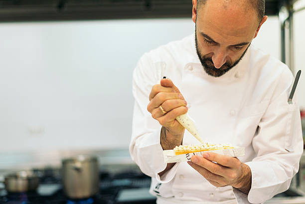 istock Male professional chef cooking in a kitchen. 516801106