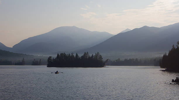 istock Adirondack Elk Lake Morning Mist and Rowboat 516801222