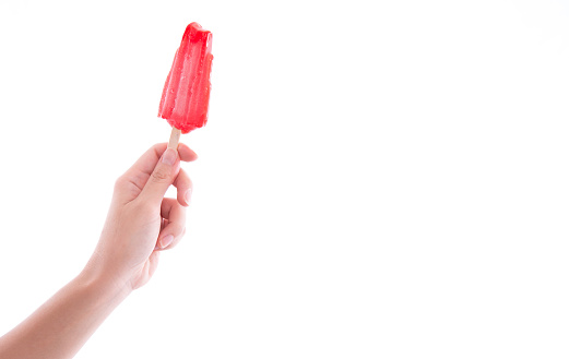 woman hand holds ice lolly