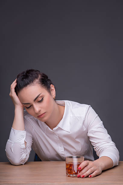 istock Serious woman wearing white blouse 516808599