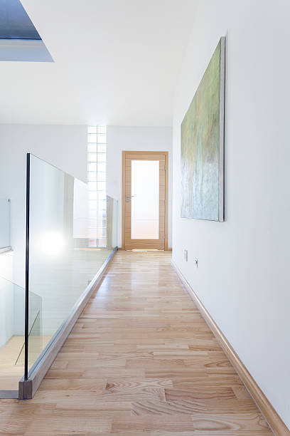 istock Contemporary corridor with glass banister 516809259