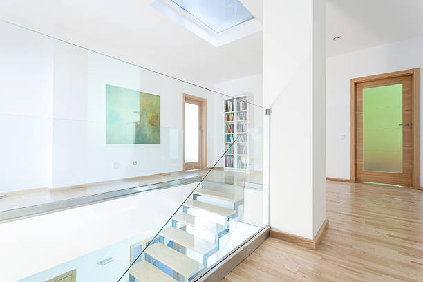 istock Modern hallway with glass staircase 516809269