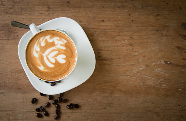 istock Cup of art latte or cappuccino coffee 516809553