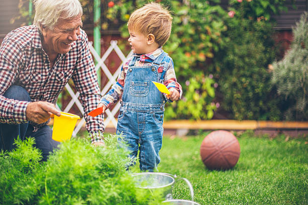 istock Gardening with grandfather 516810271