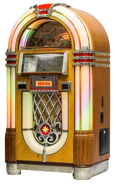 The most popular jukebox of all times has been meticulously reproduced in Rock-Ola’s Series V Bubbler. The Bubbles of air perk merrily to the top of the 8 bubble tubes, while a “Kaleidoscope” of colors flows through 4 color translucent plastic cylinders. It’s the 50’s all over again when the changer flips the CDs right in front of you. All 19 trim pieces are genuine die cast metal, triple-plated with copper, nickel, and polished chrome. With quality in mind, only the finest hardwoods adorn this beauty. The handcrafted quality of these classics is a tradition Rock-Ola proudly continues. Incredible sound quality with 5-speaker, dual 3-way system and Peavey Electronics 1,600 watt power amplifier for "Live" performance reproduction. 