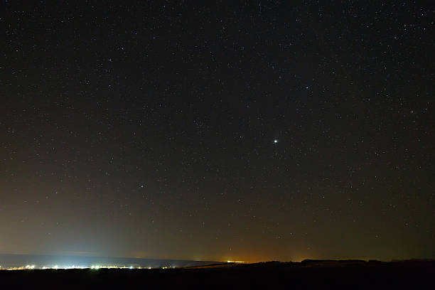 istock Planet Jupiter in the night starry sky, 516812782