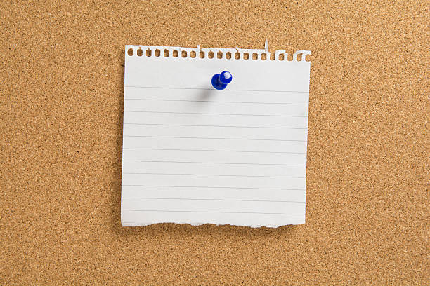 torn note paper torn paper with blue push pin on a cork board white piece of paper pinned to a wooden surface stock pictures, royalty-free photos & images