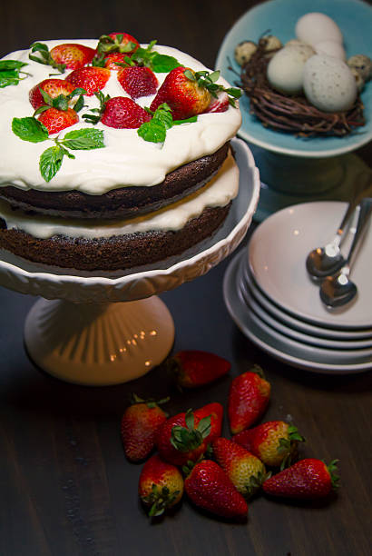 istock Chocolate cake with cream and strawberry 516814710