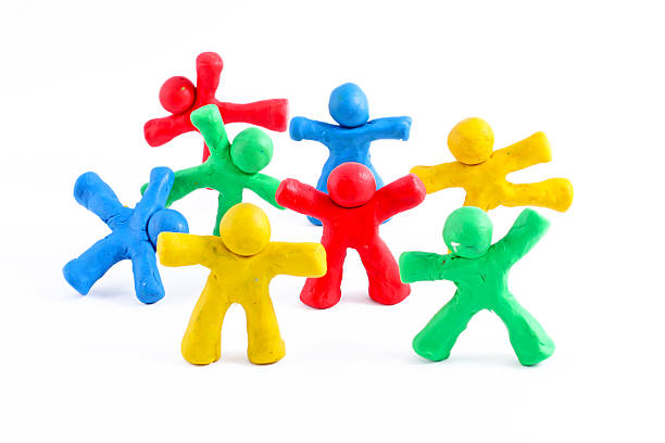 istock cheerful team of plasticine guys 516815362