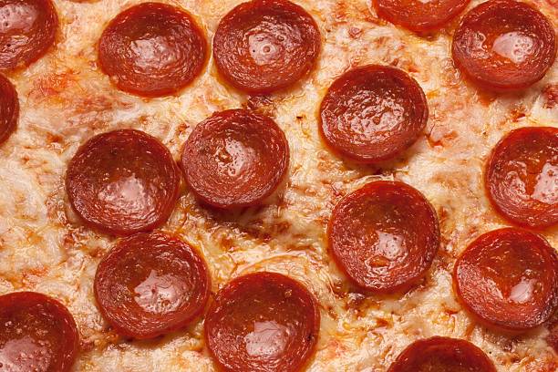 istock Pepperoci Pizza close up for backgounds 516816346