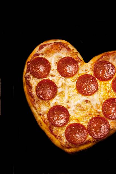 istock Heart shaped Pizza for Valentine's day 516816356