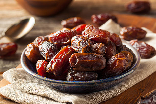 Raw Organic Medjool Dates Raw Organic Medjool Dates Ready to Eat date fruit stock pictures, royalty-free photos & images