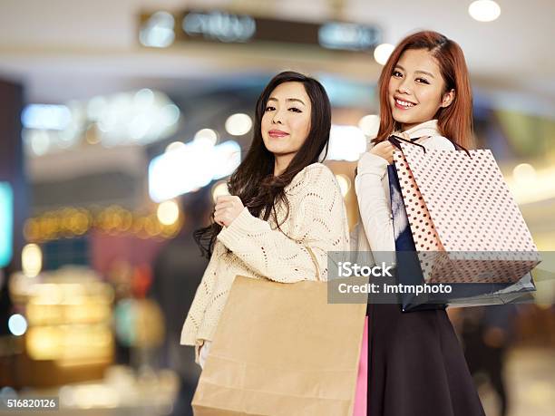 Happy Women With Shopping Bags Stock Photo - Download Image Now - Shopping, Retail, Korea