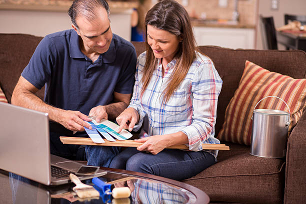 istock Couple shops online for home improvement items. 516823448