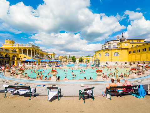 Budapest, Hungary - June 20, 2014: People soaking in one of the pools in Lukacs Thermal Baths in Budapest, Hungary. 
