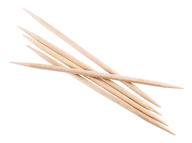 istock wooden toothpick isolated 516827244