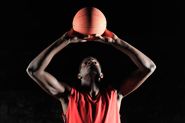 istock Basketball player gripping the ball 516828230