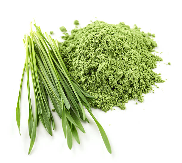 haufen von grünen pulver - wheatgrass nutritional supplement antioxidant grass stock-fotos und bilder