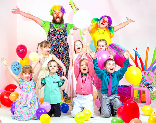 istock Children's Party with Cheerful Clowns 516855644