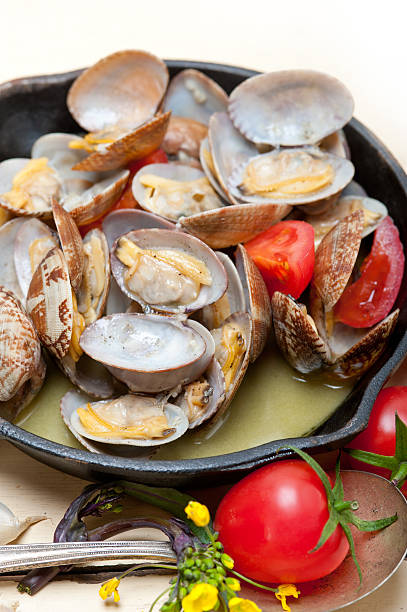 istock fresh clams on an iron skillet 516857228