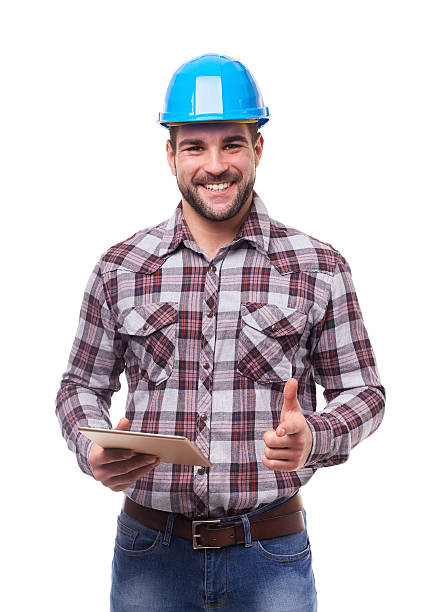 istock Smiling manual worker in blue helmet with digital tablet 516857266