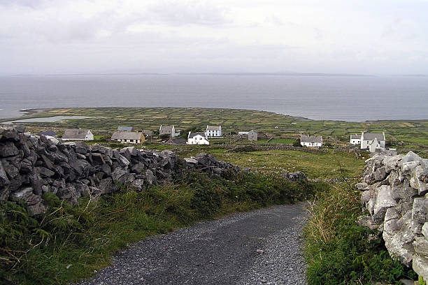 Country road and cottages on the desolate Aran islands in Ireland