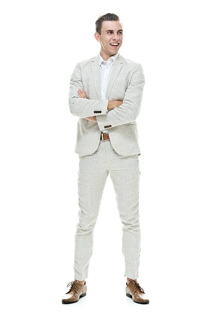 istock Smiling smart casual man standing with arms crossed 516871523