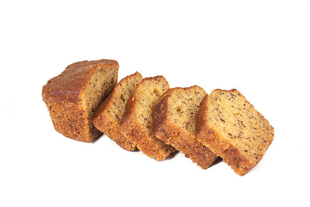 istock Homemade banana bread sliced on white background 516888558