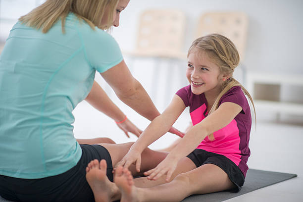 istock Stretching to Reach Their Toes 516889618
