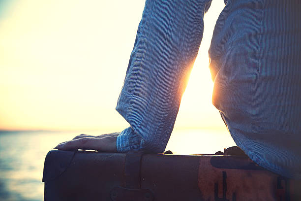 woman waiting for a ship to leaving on a trip