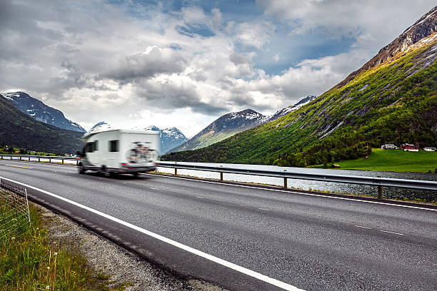 istock Caravan car travels on the highway. 516898134