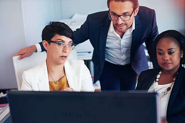 istock Putting their heads together 516899120