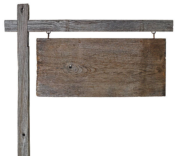 istock Old weathered wooden sign board. 516900030