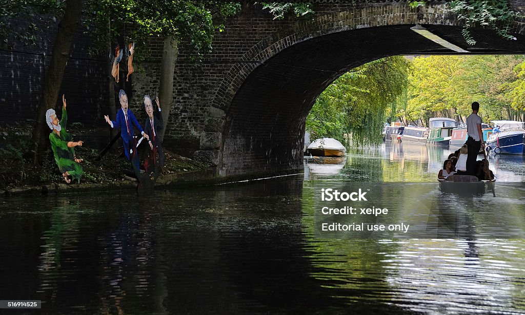 Gondola on the Regent's Canal in London London, United Kingdom- September 12, 2014: people riding on a gondola on the regent's canal in london Camden - London Stock Photo