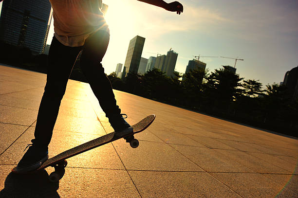 istock skateboarding woman jumping 516916639
