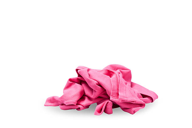 istock Pile of clothes isolated on white background. 516920106