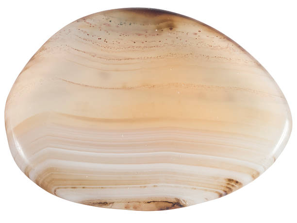 istock semi-transparent agate pebble macro isolated on white 516924066