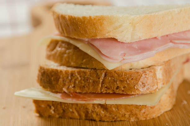 istock Ham and Cheese Sandwiches with both White and Wholemeal Bread 516926950