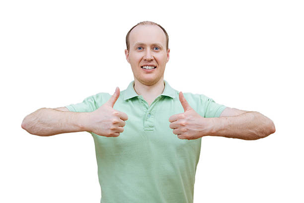 istock Young happy man with thumbs up 516926964