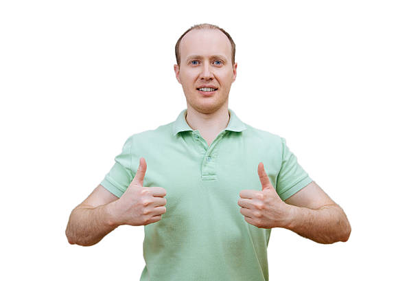 istock Young happy man with thumbs up 516927058