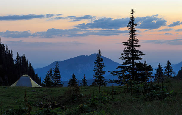 istock Camping in tent on the mountains. 516927410