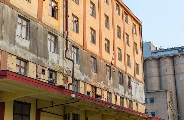 istock Abandoned rundown industrial factory buildings 516927708