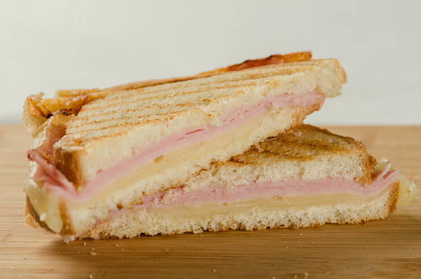 istock Toasted Ham and Cheese Sandwiches with White and Wholemeal Bread 516929926