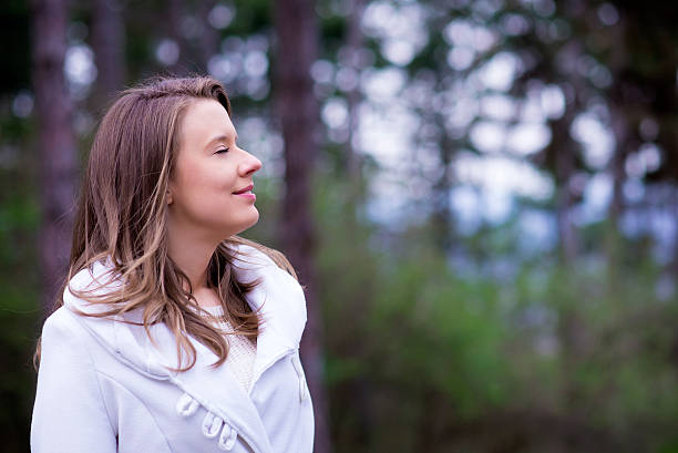 istock Beautiful woman in autumnal park 516932004